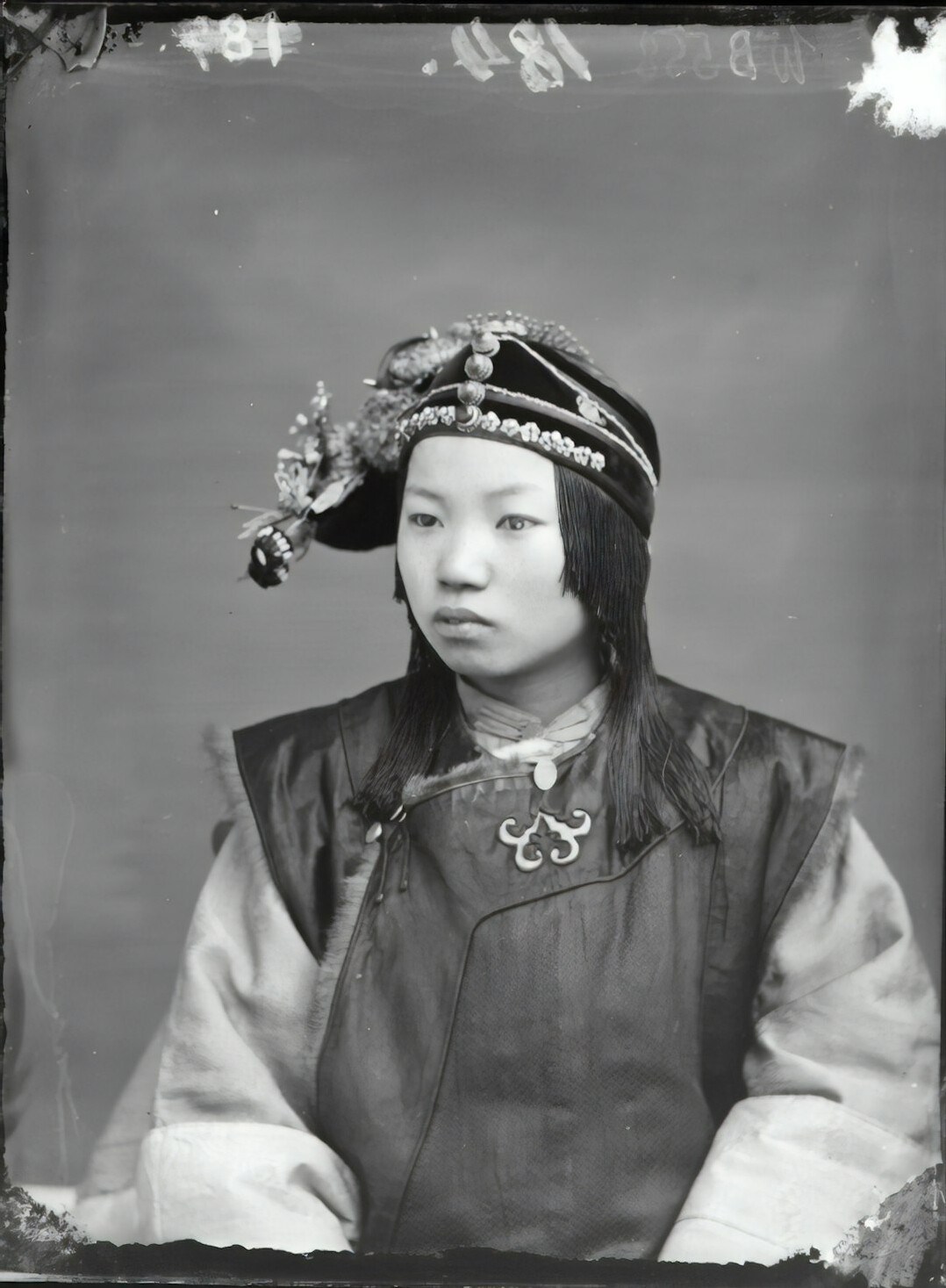 Studio portrait of a young Malaysian Chinese woman smiling