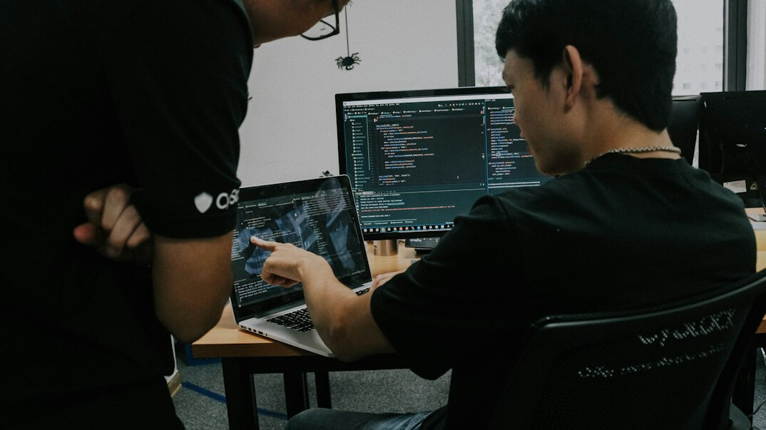 coder working on laptop